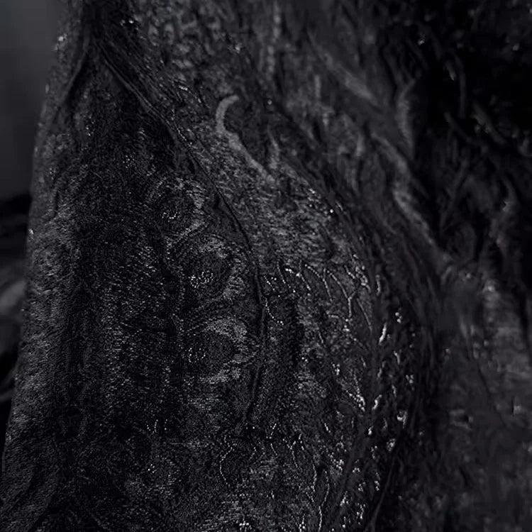 Close-up of Longan Craft’s Luxury Embossed Brocade Fabric by the yard, a metallic jacquard brocade with intricate, swirling patterns and velvety shine—premium material ideal for elegant dressmaking.