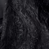 Close-up of Longan Craft’s Luxury Embossed Brocade Fabric by the yard, a metallic jacquard brocade with intricate, swirling patterns and velvety shine—premium material ideal for elegant dressmaking.