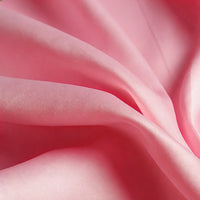 Close-up of Longan Craft's Matte Satin Fabric By The Yard showing soft pink matte folds and a smooth, silky texture—ideal for comfortable bridesmaid dresses and elegant projects.