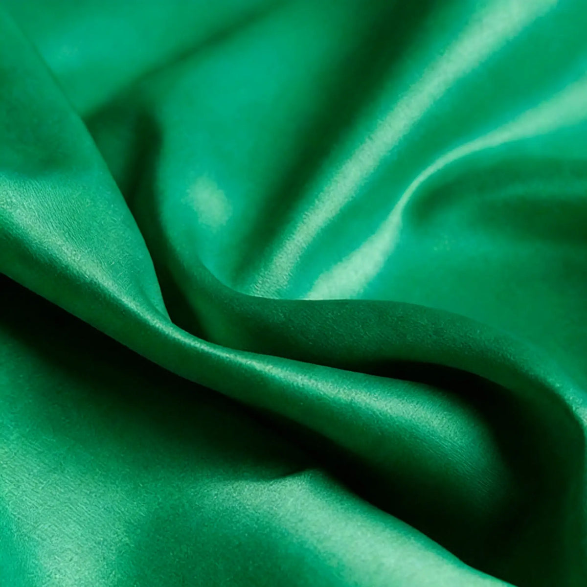 Close-up of Longan Craft's Matte Satin Fabric By The Yard—solid color with a soft satin texture, gentle folds, and slight sheen—ideal for comfortable bridesmaid dresses and elegant attire.