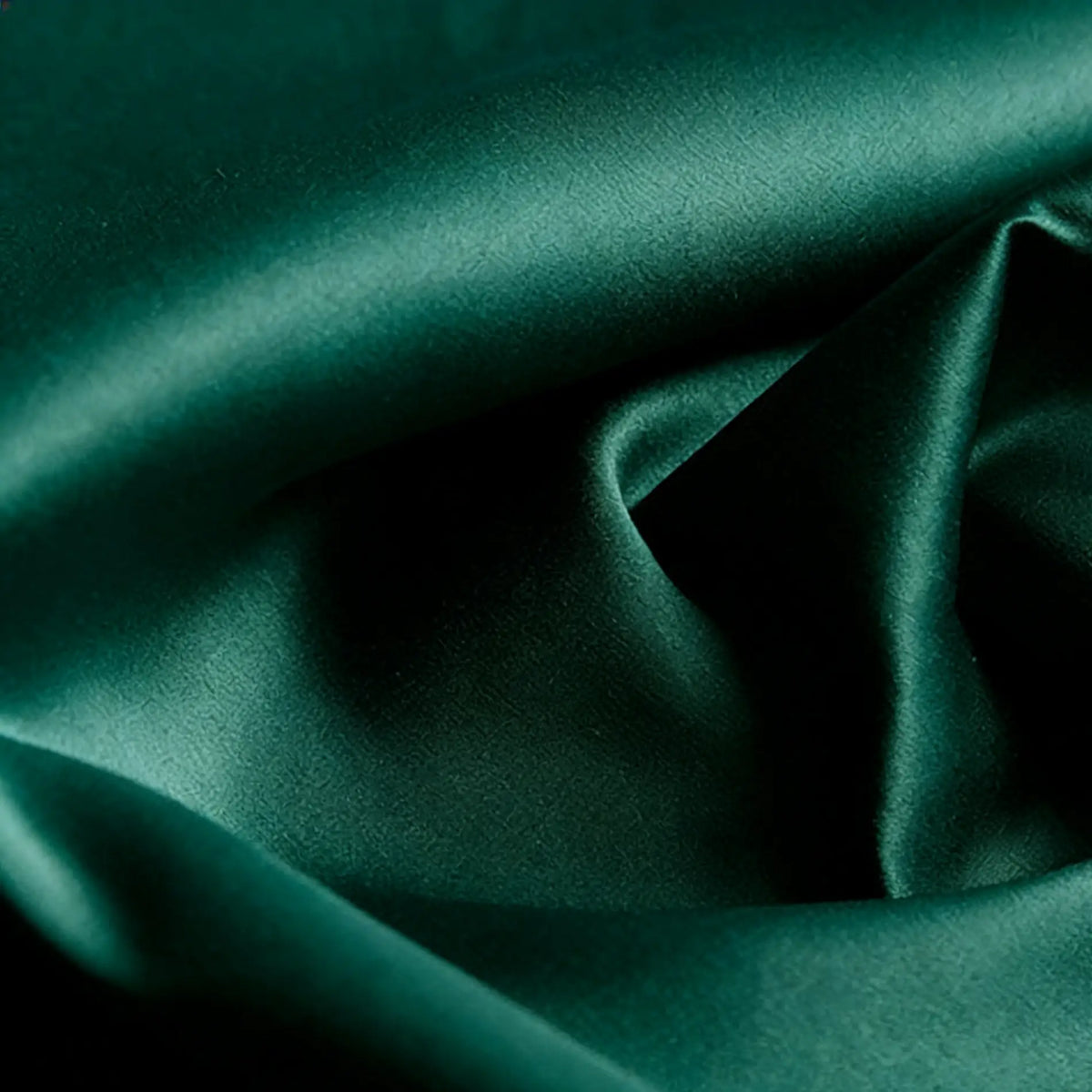 Close-up of Longan Craft's Matte Satin Fabric by the yard, a comfortable, solid-color satin textile with soft folds and a subtle sheen—perfect for bridesmaid or wedding dresses.