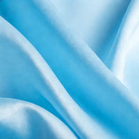 Close-up of Longan Craft Matte Satin Fabric By The Yard in light blue, featuring a soft, smooth texture and gentle folds—ideal for bridesmaid dresses or any project needing solid color satin by the yard.