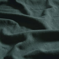 Close-up of Medium Weight Viscose Linen Fabric by Longan Craft, featuring a washed finish and soft texture with gentle folds and natural shadows. Ideal breathable material for clothing, sold by the yard in multicolor options.