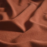 Close-up of Medium Weight Viscose Linen Fabric by Longan Craft, a breathable multicolor material with washed finish. Gentle folds highlight the soft crinkle texture and smooth, slightly matte surface—ideal for clothing projects.