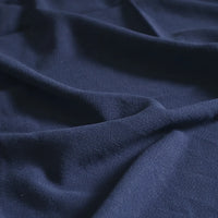 A close-up of Longan Craft’s Medium Weight Viscose Linen Fabric By The Yard shows its soft, breathable texture, washed finish, and gentle folds in multicolor, making it ideal for comfortable clothing.