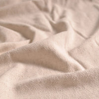 Close-up of Longan Craft’s Medium Weight Viscose Linen Fabric By The Yard, featuring a washed finish and gentle folds. This breathable, textured multicolor viscose material is cozy and natural—ideal for relaxed clothing or crafts.