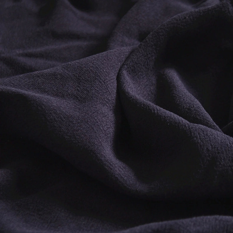 Close-up of Longan Craft Medium Weight Viscose Linen Fabric by the yard, featuring multicolor washed finish with visible texture and gentle folds that highlight the breathable material—ideal for viscose clothing projects.