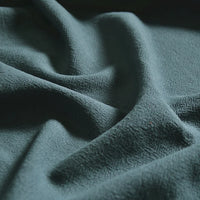 Close-up of Longan Craft's Medium Weight Viscose Linen Fabric by the yard, featuring a soft, textured washed finish in multicolor tones; breathable and ideal for viscose clothing with gentle folds that highlight its smooth surface.