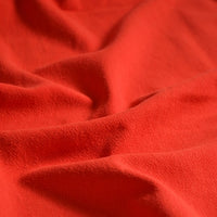 Close-up of Longan Craft Medium Weight Viscose Linen Fabric by the yard, showing its multicolor washed finish, breathable texture, and gentle folds that create appealing shadows and highlights—ideal for comfortable clothing.