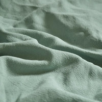 A close-up of Longan Craft's Medium Weight Viscose Linen Fabric By The Yard in multicolor, showing its washed finish, gentle folds, subtle texture, and smooth, breathable surface—ideal for airy viscose clothing material.