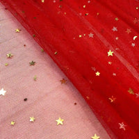 Close-up of Longan Craft’s Moon Star Sequins Tulle Fabric in light pink and red, featuring multicolor glitter stars and dots—perfect for evening gowns, stage costumes, or dancewear.