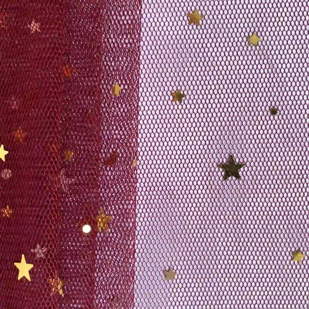 A close-up of Moon Star Sequins Tulle Fabric by Longan Craft shows maroon and white mesh with scattered multicolor gold star sequins—ideal for stage costumes and perfect for creative projects.