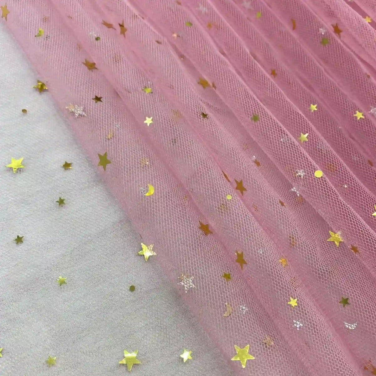 A close-up of Longan Craft's Moon Star Sequins Tulle Fabric By The Yard, a multicolor glitter tulle adorned with celestial sequins—perfect for stage costumes, elegant fashion, and creative projects.