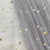 Longan Craft’s Moon Star Sequins Tulle Fabric features multicolor glitter stars and moons on sheer tulle, perfect for standout stage costumes or dancewear. Sold by the yard, this fabric adds a delicate, celestial shimmer to any project.
