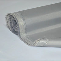 A close-up of a rolled sheet of Longan Craft Multicolor 300D PU Coated Polyester Oxford Fabric, showing its reflective surface and unfinished edge, displayed on a plain white background—ideal for bags and backpacks.