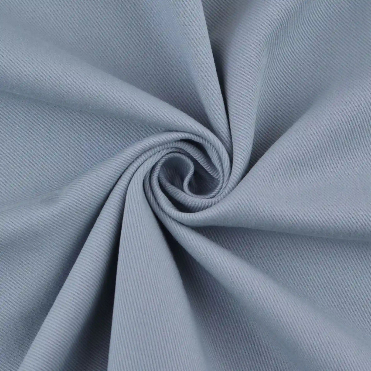 Close-up of Longan Craft Multicolor Cotton Bamboo Blend Lyocell Fabric by the yard, twisted to showcase its soft, fine diagonal twill lines and wrinkle-free texture—ideal lyocell textile for DIY pants.