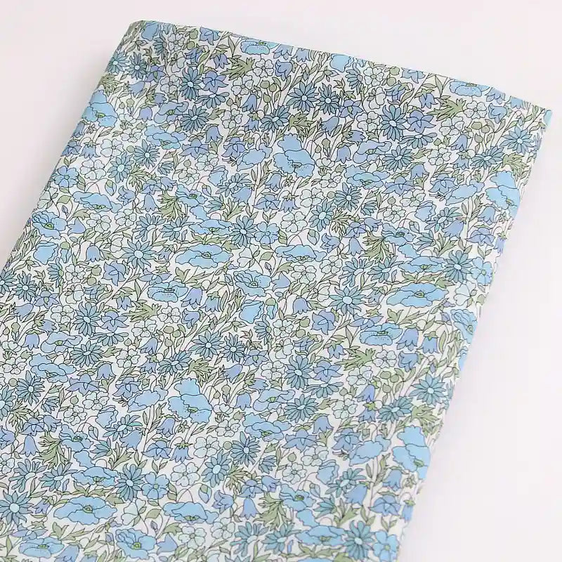 Longan Craft's Multicolor Fine Cotton Printed Lawn Fabric by the yard is a lightweight floral print lawn material with a dense pattern—ideal for summer clothing and lawn projects.