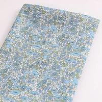 Longan Craft's Multicolor Fine Cotton Printed Lawn Fabric by the yard is a lightweight floral print lawn material with a dense pattern—ideal for summer clothing and lawn projects.