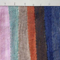 Seven swatches of Longan Craft’s Multicolor Heathered Crepe Fabric By The Yard are arranged side by side, displaying a vibrant assortment of colors and patterns in 100% linen sandwashed crepe. Each swatch is numbered from 7 to 12 above, with every number representing a unique variation of this durable apparel fabric.