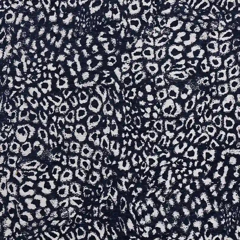 Multicolor Leopard Chenille Fabric By The Yard in a dark blue and white leopard jacquard pattern with a textured polyester chenille weave.