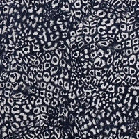Multicolor Leopard Chenille Fabric By The Yard in a dark blue and white leopard jacquard pattern with a textured polyester chenille weave.