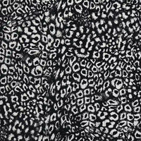 Multicolor Leopard Chenille Fabric By The Yard in a black and white leopard jacquard pattern with a textured polyester chenille weave.
