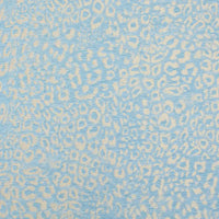 Multicolor Leopard Chenille Fabric By The Yard in light blue and cream with a textured jacquard pattern.