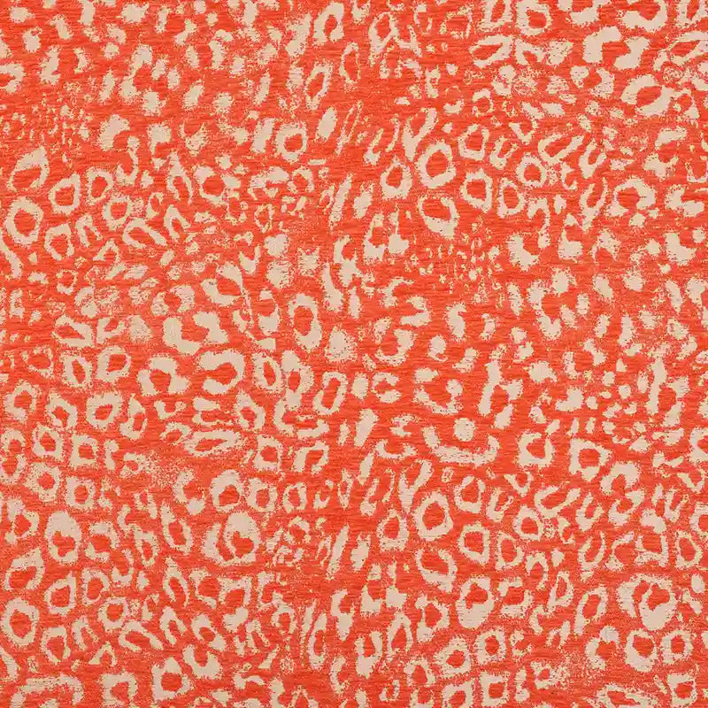 Multicolor Leopard Chenille Fabric By The Yard in a textured jacquard weave with an orange and cream leopard print pattern.