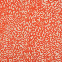 Multicolor Leopard Chenille Fabric By The Yard in a textured jacquard weave with an orange and cream leopard print pattern.