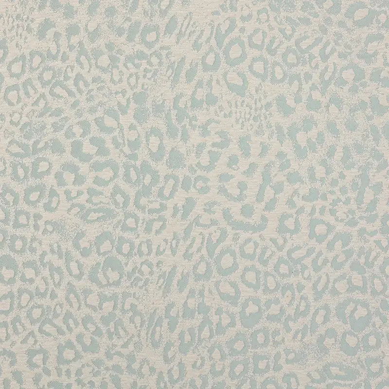 Multicolor Leopard Chenille Fabric By The Yard in a light blue and cream leopard jacquard pattern with a textured finish.
