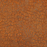 Multicolor Leopard Chenille Fabric By The Yard featuring a textured, orange and brown leopard jacquard pattern.