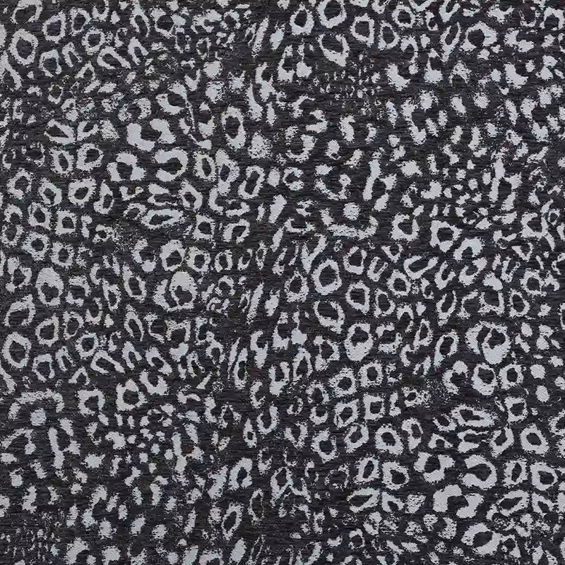 Multicolor Leopard Chenille Fabric By The Yard in a black and grey leopard jacquard pattern.