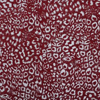 Multicolor Leopard Chenille Fabric By The Yard in a textured red and white leopard jacquard pattern.