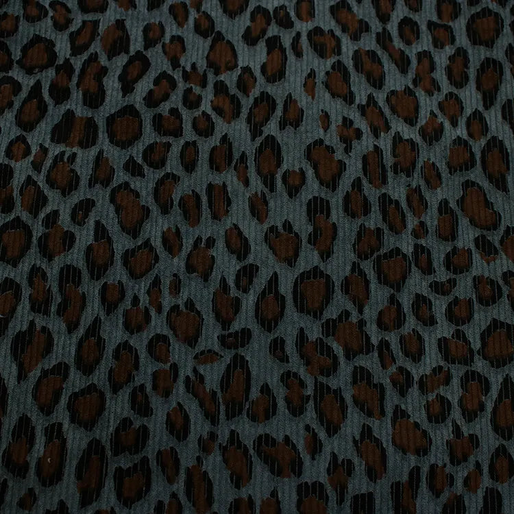 Close-up of Longan Craft's Multicolor Leopard Printed Corduroy Fabric by the yard, a soft polyester corduroy textile with animal print—perfect for bold apparel and creative projects.
