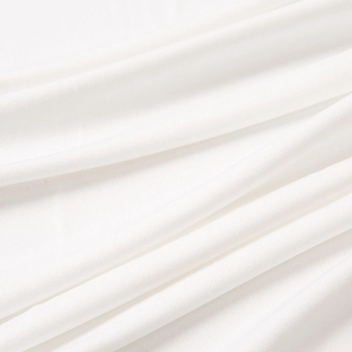 Close-up of Longan Craft’s Multicolor Polyester Jersey Fabric by the yard, showing smooth, stretchable elastane jersey with soft folds. The breathable texture creates gentle, shadowed lines—perfect for jersey dress projects.