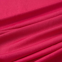 Close-up of Longan Craft's Multicolor Polyester Jersey Fabric By The Yard, a stretchable elastane jersey with bright pink, wrinkle-resistant texture and soft diagonal folds—ideal for dresses and crafts.