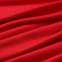 Close-up of Longan Craft Multicolor Polyester Elastane Jersey Fabric shows smooth, slightly shiny, wrinkle-resistant texture with gentle folds and soft shadows—perfect stretchable jersey fabric by the yard for dresses.