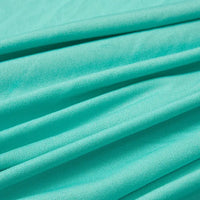 Close-up of folded Multicolor Polyester Jersey Fabric by Longan Craft, showing its smooth texture, fine weave, and breathable stretch—ideal for dresses and crafts.