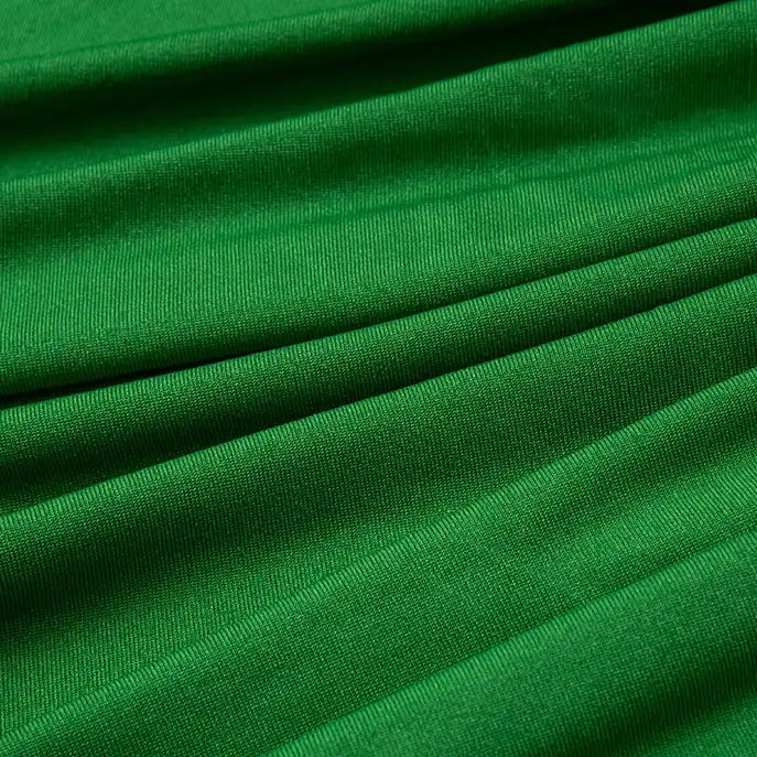 Close-up of Longan Craft Multicolor Polyester Jersey Fabric by the Yard with visible texture, breathable stretch, and diagonal folds—ideal stretchable elastane jersey fabric for dresses.