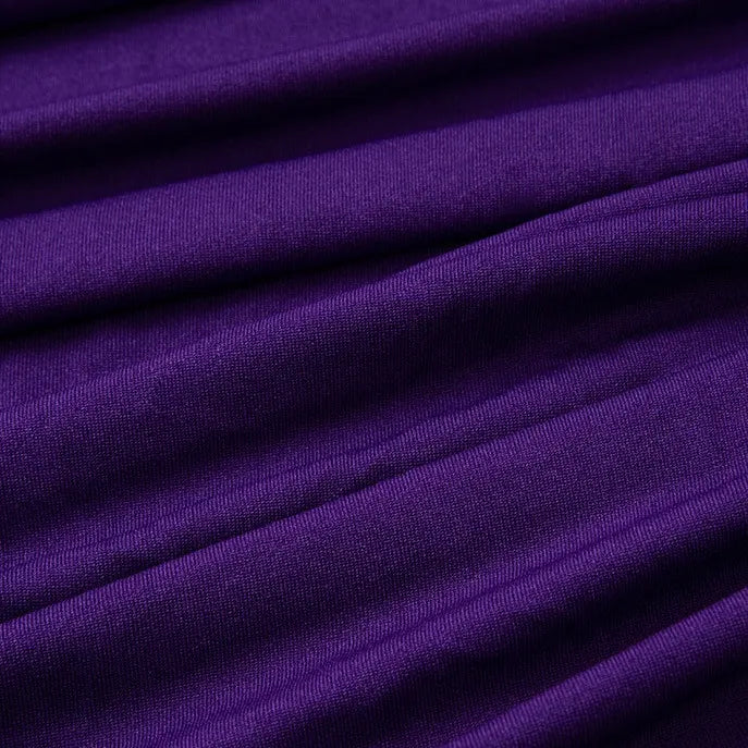 Close-up of Longan Craft Multicolor Polyester Jersey Fabric By The Yard, a stretchable elastane jersey dress fabric with visible folds and a soft, smooth, wrinkle-resistant texture.