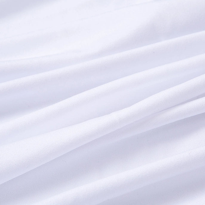 Close-up of smooth, multicolor polyester jersey fabric by Longan Craft, featuring wrinkle-resistant, breathable stretchable elastane material with soft folds and gentle shadows that highlight its clean appearance.