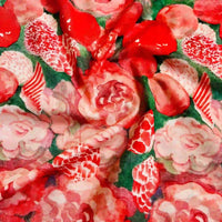 The Multicolor Printed Lawn Fabric By The Yard from Longan Craft features vibrant watercolor-style red and pink flowers with green leaves, creating a dense floral pattern on soft cotton lawn material.