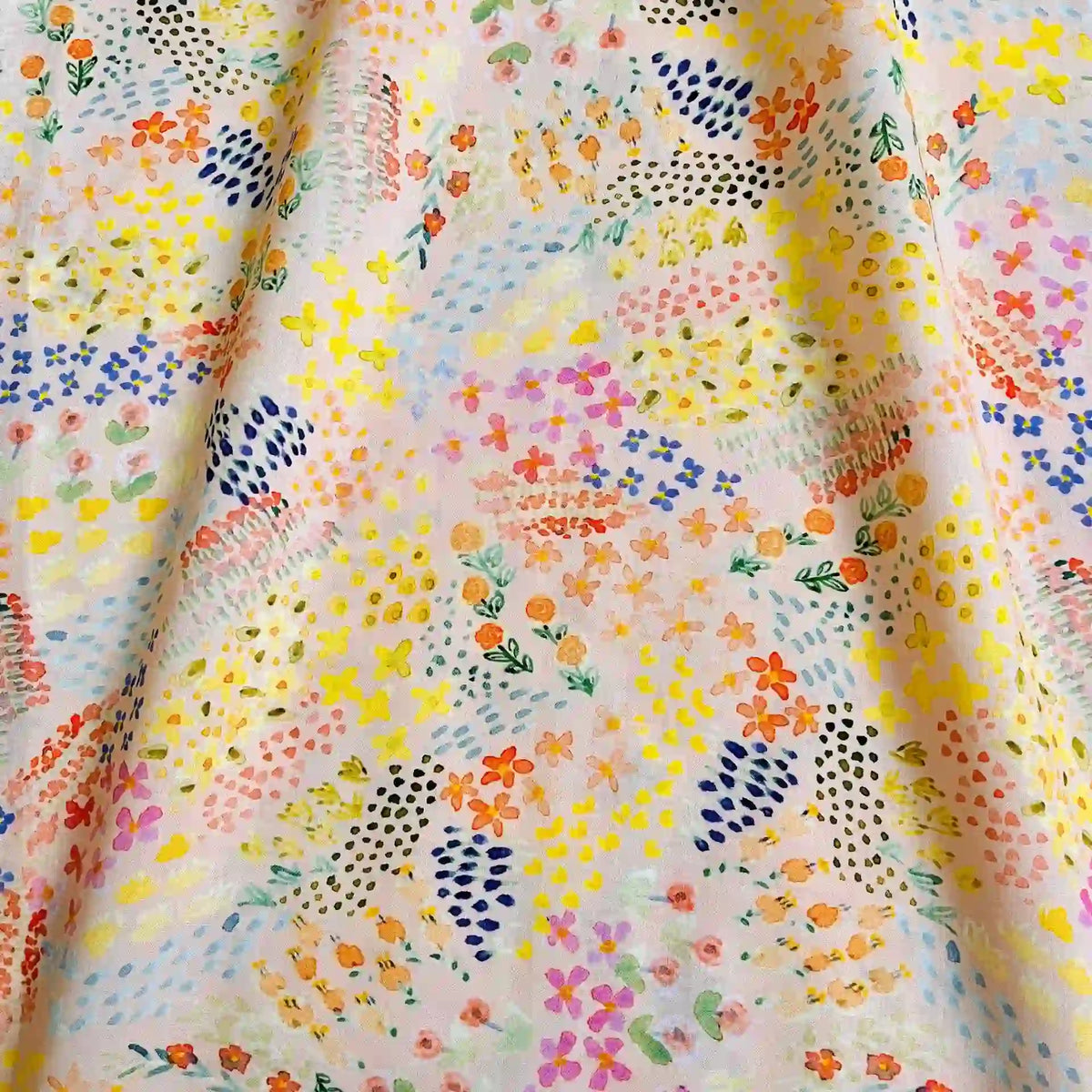 Longan Craft’s Multicolor Printed Lawn Fabric by the Yard features soft cotton lawn material with hand-painted florals and abstract patterns on a pastel background—ideal for vibrant dressmaking projects.