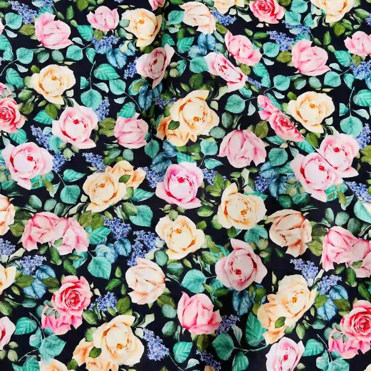 Longan Craft’s Multicolor Printed Lawn Fabric By The Yard features pink and yellow roses, green leaves, and purple flowers on a dark background—a vibrant floral design on soft cotton lawn for your creative projects.
