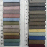 Two columns of numbered Longan Craft Multicolor Rayon Gabardine Fabric by the Yard swatches in blues, grays, pinks, greens, browns, beige, yellow, and dark red are displayed on a white grid background with numbers 1–36.