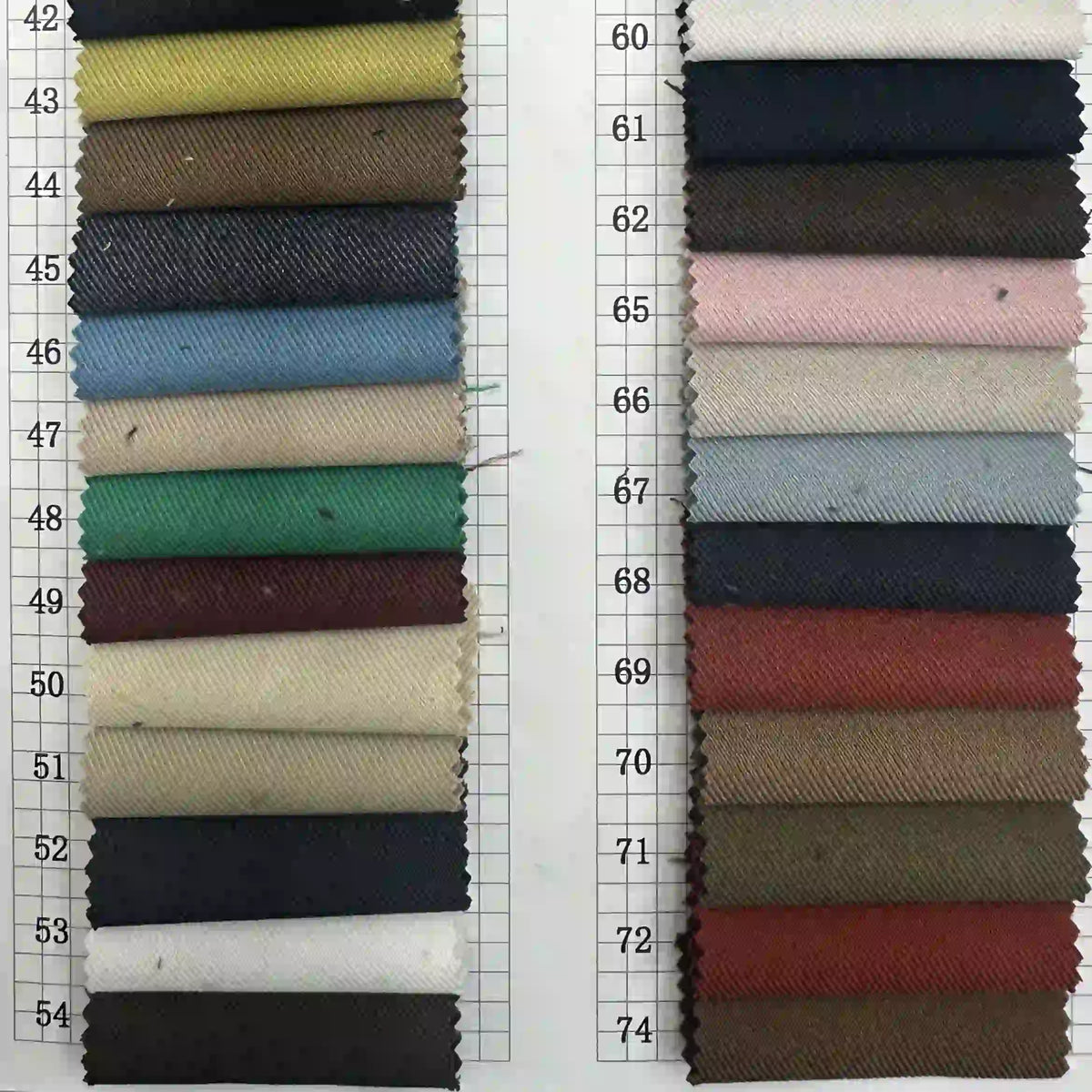 Longan Craft's Multicolor Rayon Gabardine Fabric by the yard features wrinkle-resistant stretch viscose twill in vibrant yellows, blues, reds, greens, browns, and neutrals—perfect for custom uniforms and versatile projects.