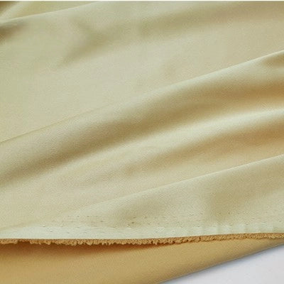 A close-up of Longan Craft’s Multicolor Satin Fabric By The Yard shows its smooth, silky polyester texture with a slightly folded surface and raw edge—perfect for apparel and textile projects.