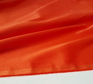 A close-up of Longan Craft's Multicolor Satin Fabric By The Yard shows its silky polyester texture and glossy finish, ideal for dressmaking and apparel projects.