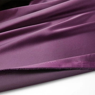 Close-up of Longan Craft’s Multicolor Satin Fabric by the Yard—silky polyester satin with a soft sheen, shown draped in gentle folds on a white background. Perfect textile for apparel and crafts.