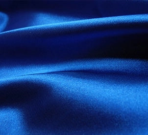 A close-up of Longan Craft's Multicolor Satin Fabric By The Yard shows its silky polyester texture and shiny finish—ideal for elegant apparel and dressmaking projects.